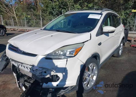 2014 Ford Escape Titanium z USA, uszkodzony, nr VIN 1FMCU0J9XEUC15671